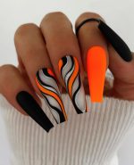 ناخن مصنوعی راسا مدل مشکی نارنجی خطی - Image 2