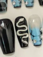 ناخن مصنوعی راسا مدل آبی مشکی طرح ماری کد RSR522