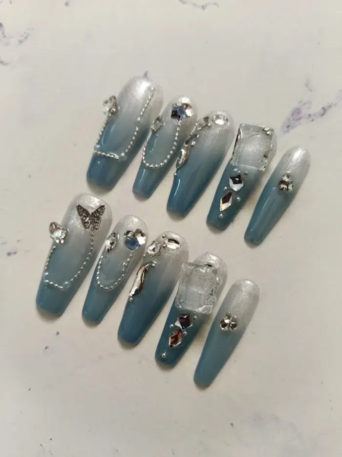 ناخن مصنوعی راسا مدل آبی بیبی بومر طرح پروانه و نگین کد RSR1178 - Image 2