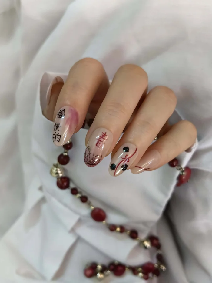 ناخن مصنوعی کوتاه راسا طرح انیمه اژدهای چینی رنگ هلویی زرشکی