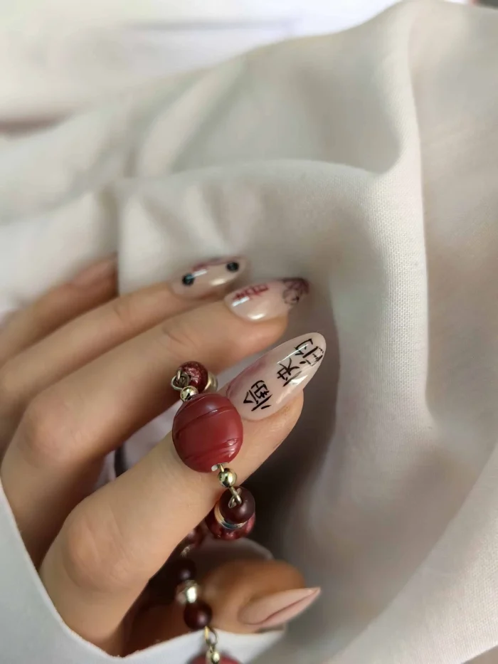 ناخن مصنوعی کوتاه راسا طرح انیمه اژدهای چینی رنگ هلویی زرشکی