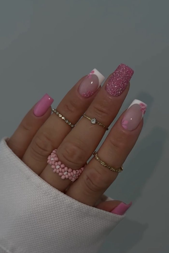 ناخن مصنوعی راسا طرح فرنچ و گل بابونه رنگ صورتی دیسکو