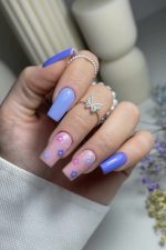 ناخن مصنوعی راسا طرح گل بابونه رنگ بنفش و آبی