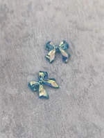 استیکر برجسته ناخن راسا طرح پاپیون فیروزه ای