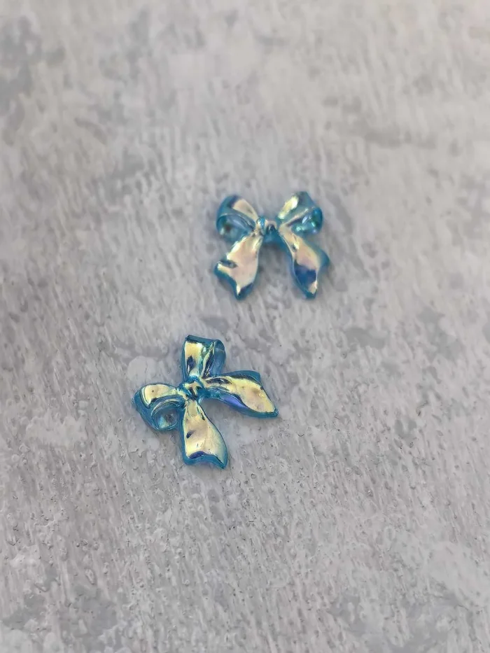 استیکر برجسته ناخن راسا طرح پاپیون فیروزه ای