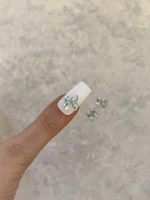 استیکر برجسته ناخن راسا طرح پاپیون فیروزه ای