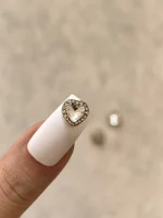 استیکر برجسته ناخن راسا طرح قلب نگین دار سفید