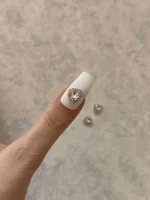 استیکر برجسته ناخن راسا طرح قلب نگین دار سفید