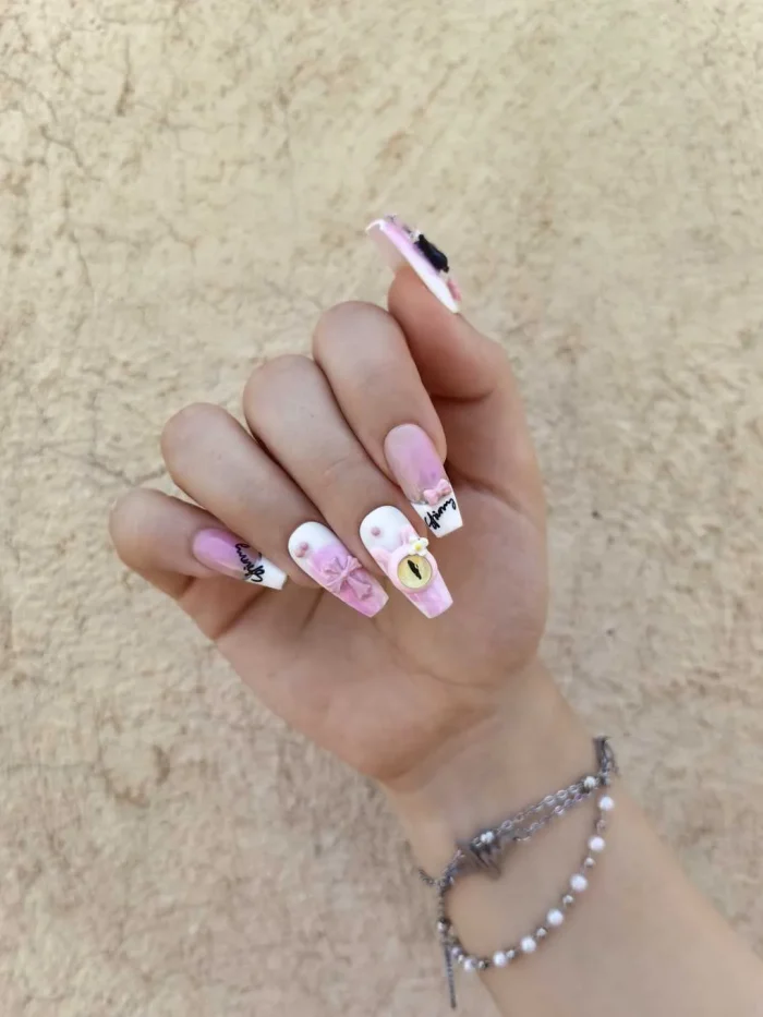 ناخن مصنوعی راسا رنگ سفید و صورتی طرح چشم و عنکبوت دارک RSR1125