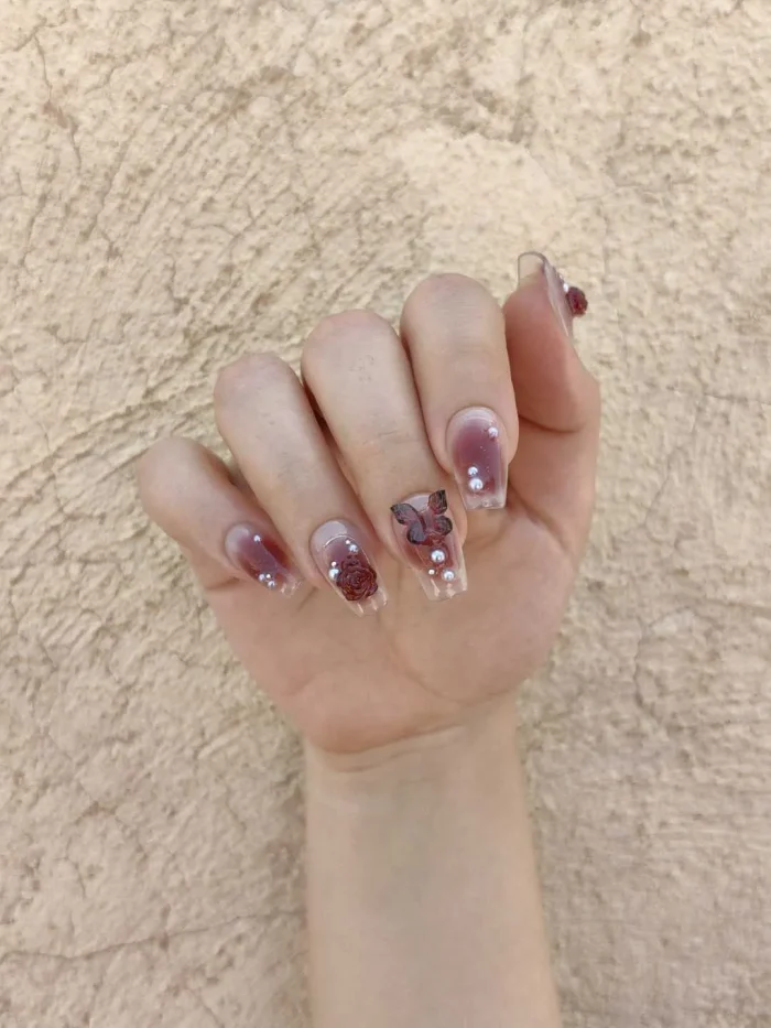 ناخن مصنوعی راسا رنگ زرشکی هلویی بیبی بومر طرح گل و پروانه RSR632