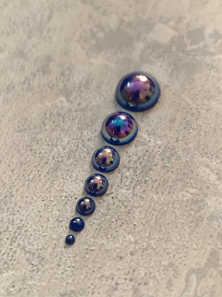 استیکر برجسته ناخن راسا طرح نگین آبی بسته 7 عددی