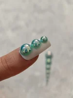 استیکر برجسته ناخن راسا طرح نگین سبز بسته 7 عددی