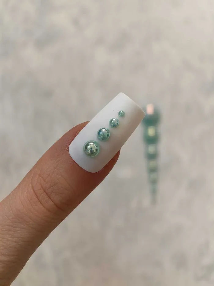 استیکر برجسته ناخن راسا طرح نگین سبز بسته 7 عددی