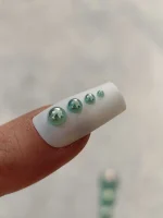 استیکر برجسته ناخن راسا طرح نگین سبز بسته 7 عددی