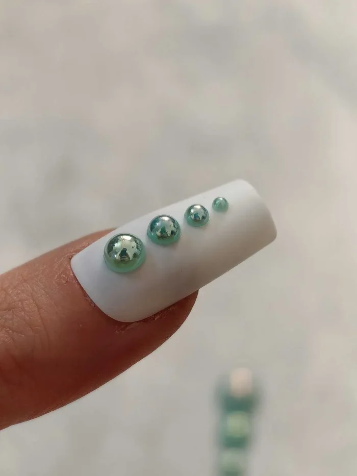 استیکر برجسته ناخن راسا طرح نگین سبز بسته 7 عددی