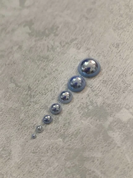 استیکر برجسته ناخن راسا طرح نگین آبی بسته 7 عددی