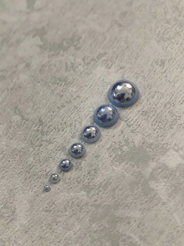 استیکر برجسته ناخن راسا طرح نگین آبی بسته 7 عددی