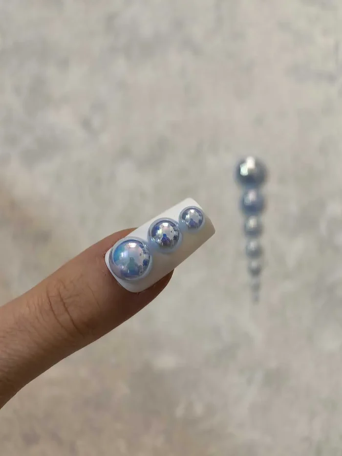 استیکر برجسته ناخن راسا طرح نگین آبی بسته 7 عددی