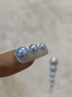 استیکر برجسته ناخن راسا طرح نگین آبی بسته 7 عددی