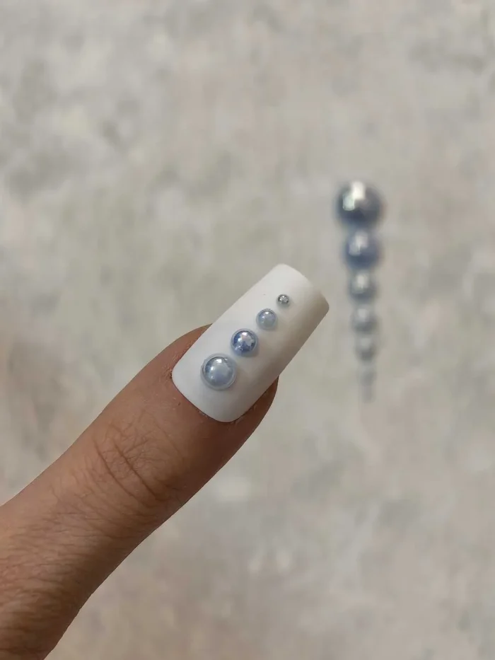 استیکر برجسته ناخن راسا طرح نگین آبی بسته 7 عددی