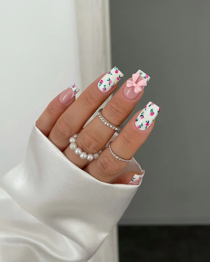 ناخن مصنوعی راسا طرح گل رز و فرنچ و پاپیون رنگ سفید و صورتی فرم مربع