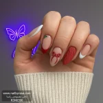 ناخن مصنوعی زمستانی قرمز رنگ طرح پاپیون