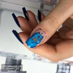 عکس ناخن مصنوعی طرح کارتونی سالیوان و کوکی رنگ سرمه ای و آبی فرم گلدانی بلند مدل RSN0002 برند راسا