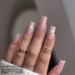 عکس ناخن مصنوعی طرح هالووین روح سفید فانتزی و نقطه های خال خالی مشکی روی زمینه صورتی پاستلی براق فرم مربعی بلند مدل RSN0082 برند راسا