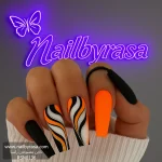 ناخن مصنوعی راسا مدل مشکی نارنجی خطی