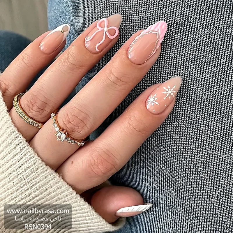 ناخن مصنوعی زمستانی طرح برف و پاپیون برجسته هلویی